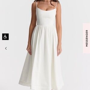 House of CB LOLITA
IVORY CORSET SUNDRESS